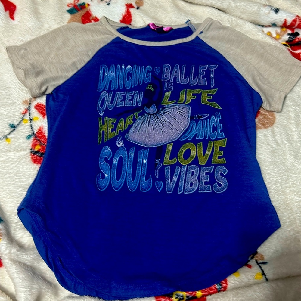 Blue and cream, dancing, and ballet, Queen shirt.